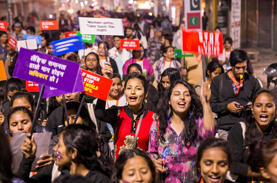 Hundreds gather in Janakpur, Nepal in December 2019, months prior to the outbreak of the COVID-19 pandemic, to take part in a Women's March to call attention for the need to reclaim women’s rights and access to safe public spaces.  Photo: UN Women/Uma Bista