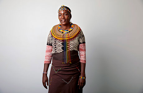 Alice Lesepen wearing her communities traditional beads and clothes. 