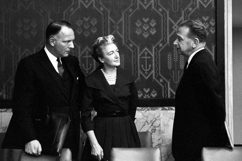 (From left) Ambassador Sivert A. Nielsen, (Norway), Ambassador Agda Rossel (Sweden), and Secretary-General Dag Hammarskjöld speak informally. Photo: UN Photo/MB