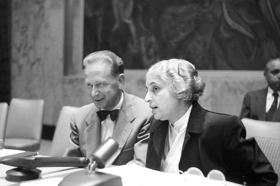 Vijaya Lakshmi Pandit, of India, President of the 8th UN General Assembly with UN Secretary-General Dag Hammarskjöld in the Security Council chamber before the meeting of Steering Committee). Photo: UN Photo/AF
