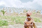When her husband was arrested during the 2015 political crisis, Luscie, 32, fled the Bujumbura province in Burundi with her eight children, with only the clothes on their backs. Since then they have been refugees at the Lusenda camp in DRC.  Photo: UN Wom